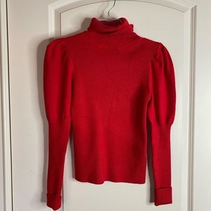 Red ribbed puff shoulder turtleneck sweater